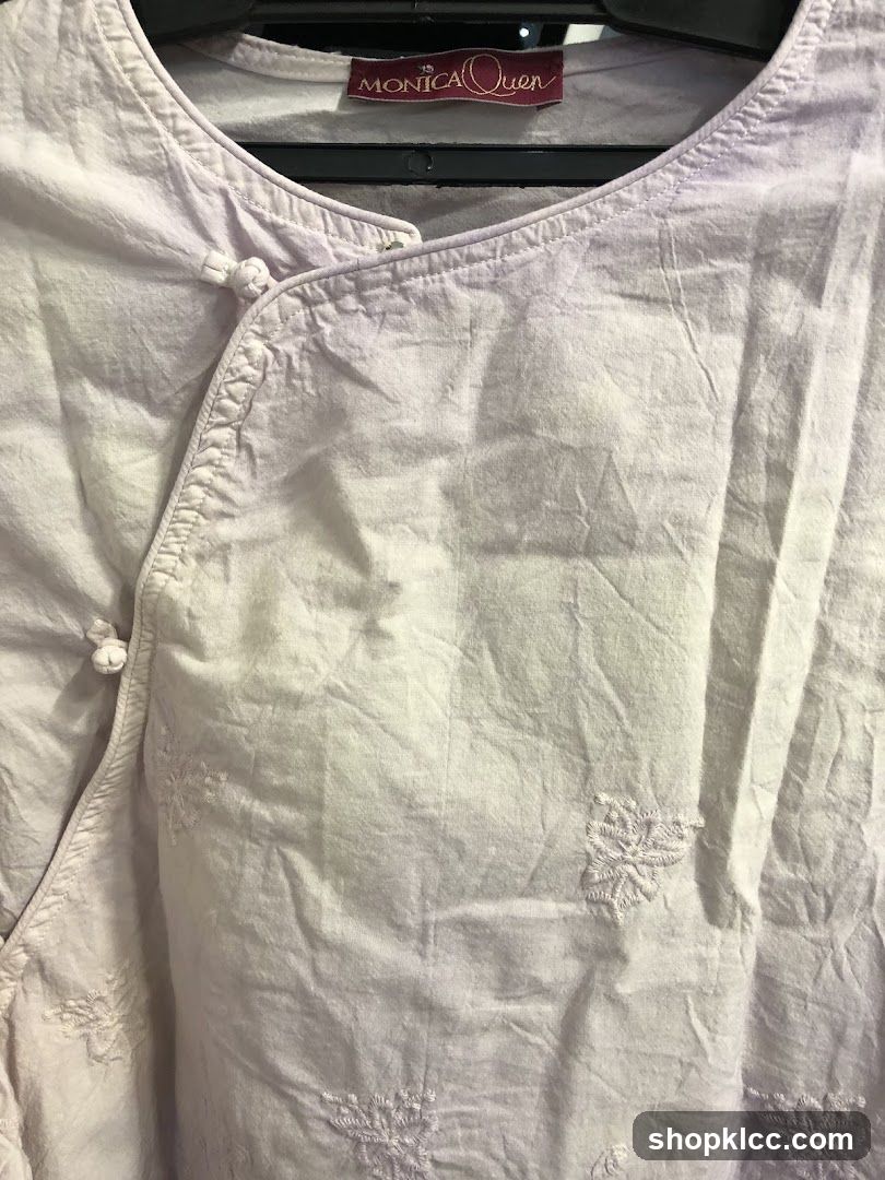 Monica Quen Clothing Tag