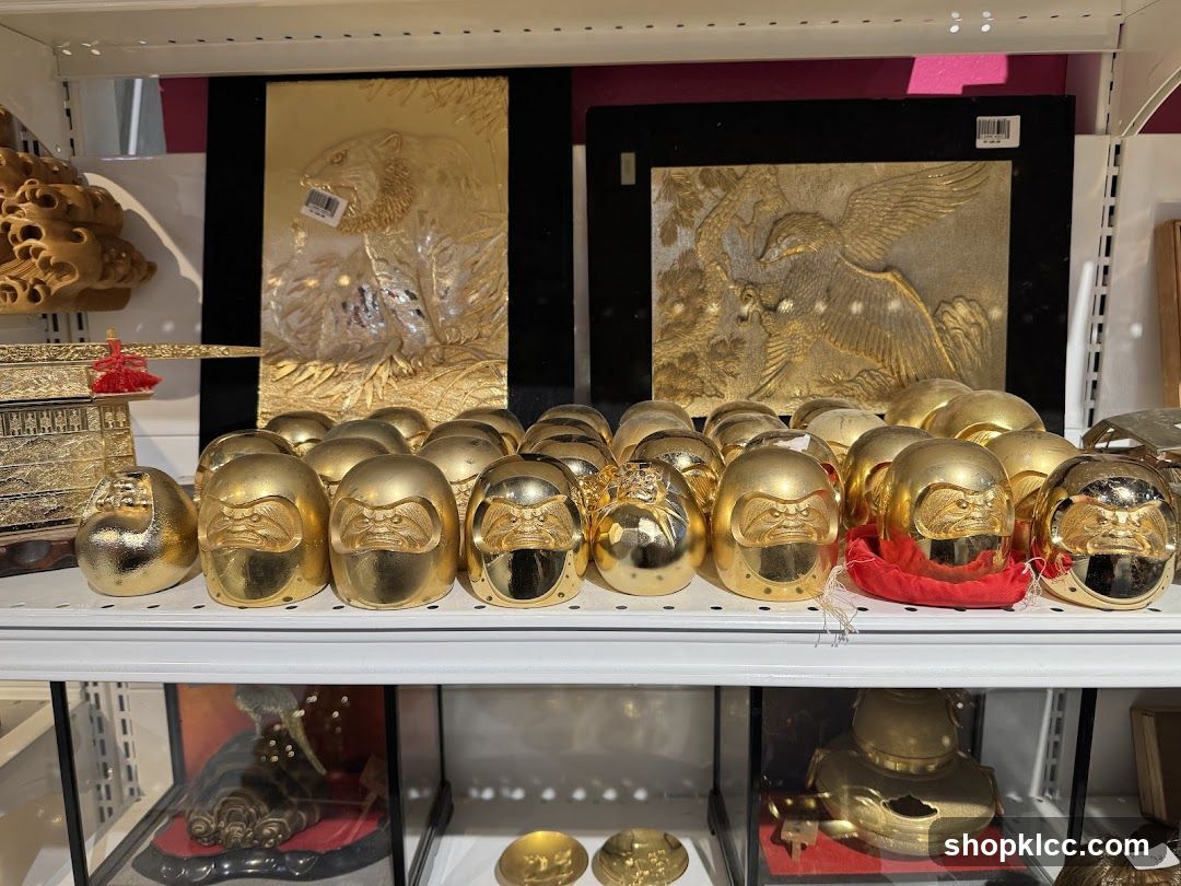 Golden Daruma Dolls and Artwork
