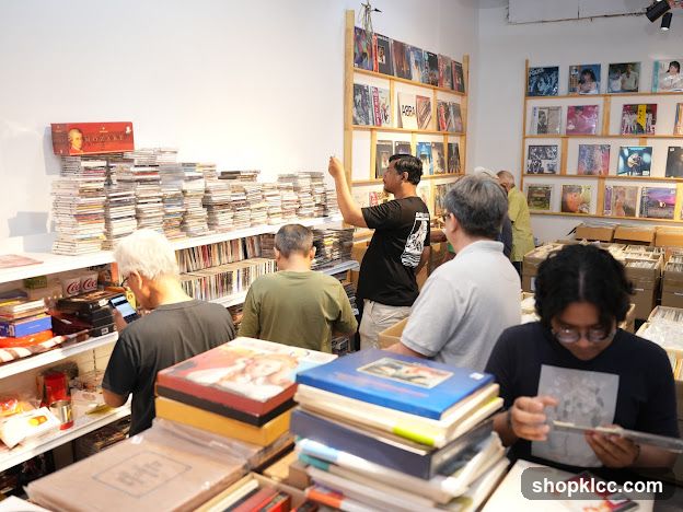People browsing records in a store