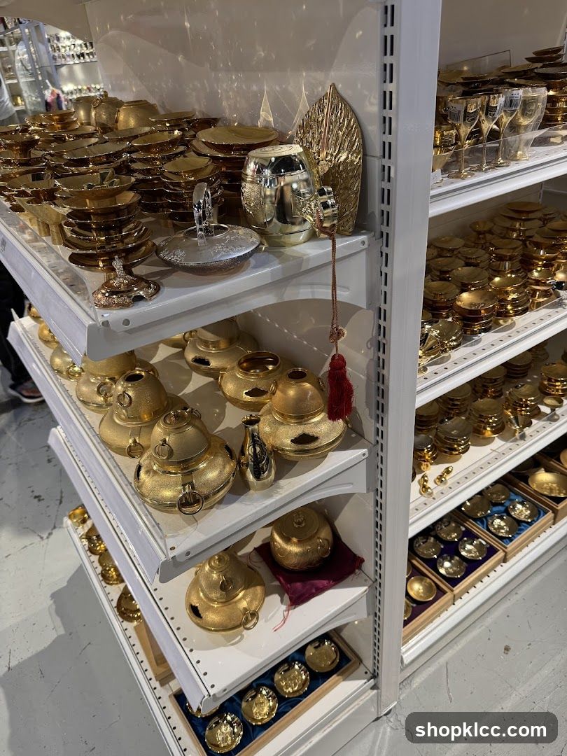 Gold-colored decorative items on shelves