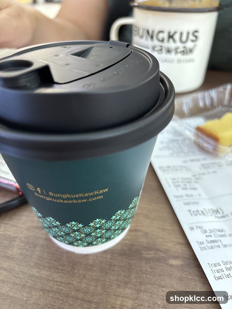 Bungkus Kawkaw Coffee Cup and Receipt