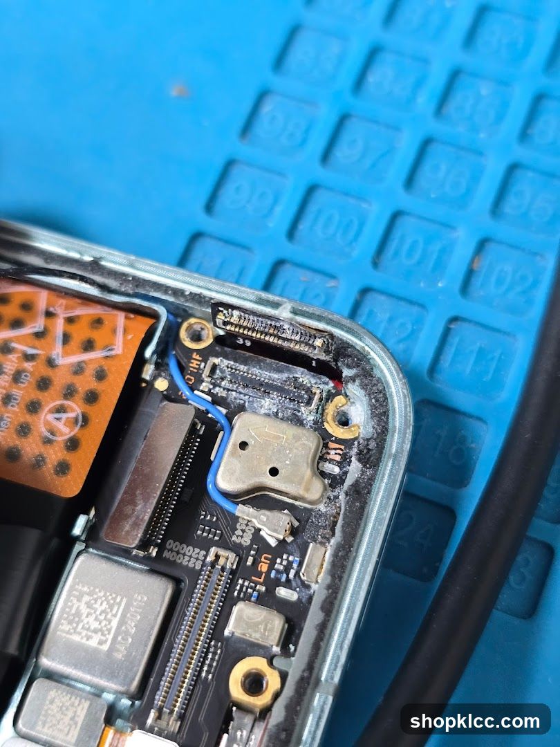 Close-up of a damaged electronic device circuit board