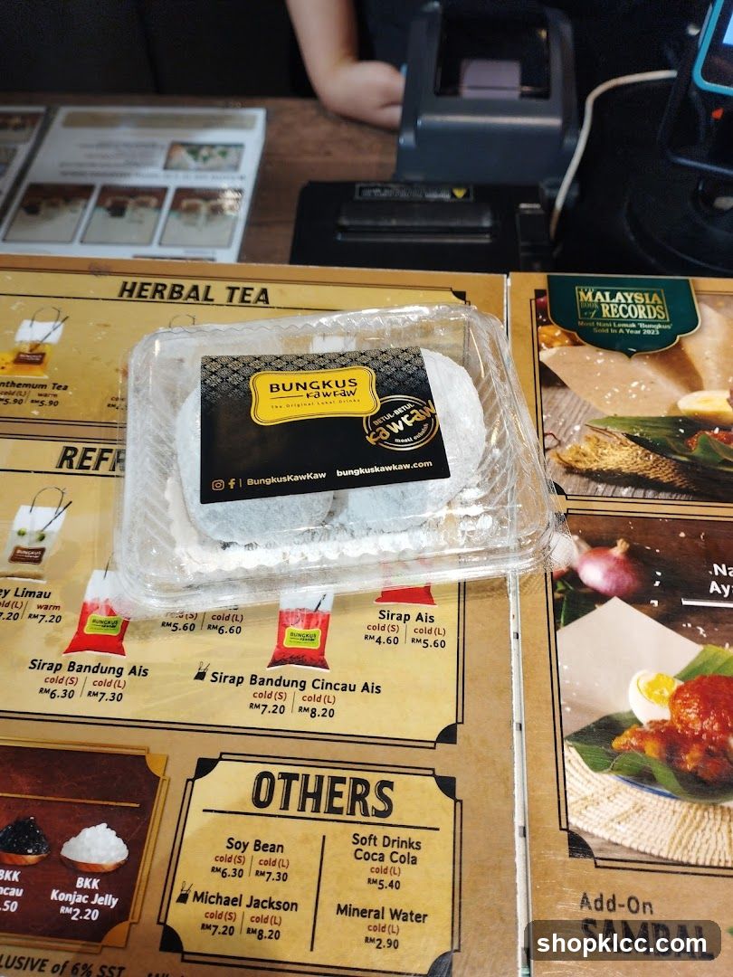 Bungkus Kawkaw Packaging on Menu Table