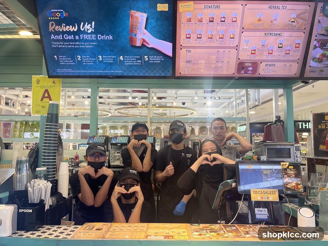 Staff at a coffee shop counter