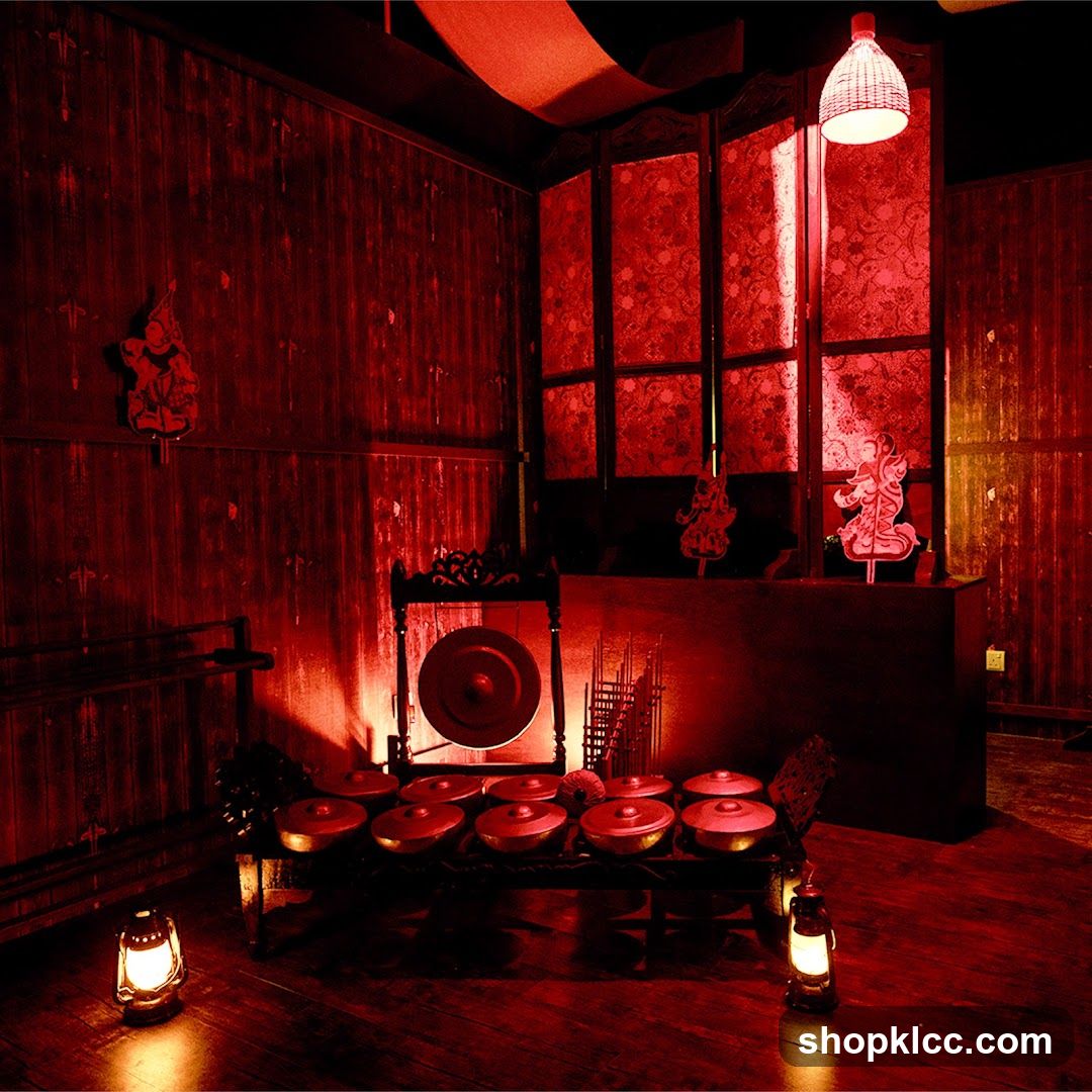Red-lit interior with traditional instruments