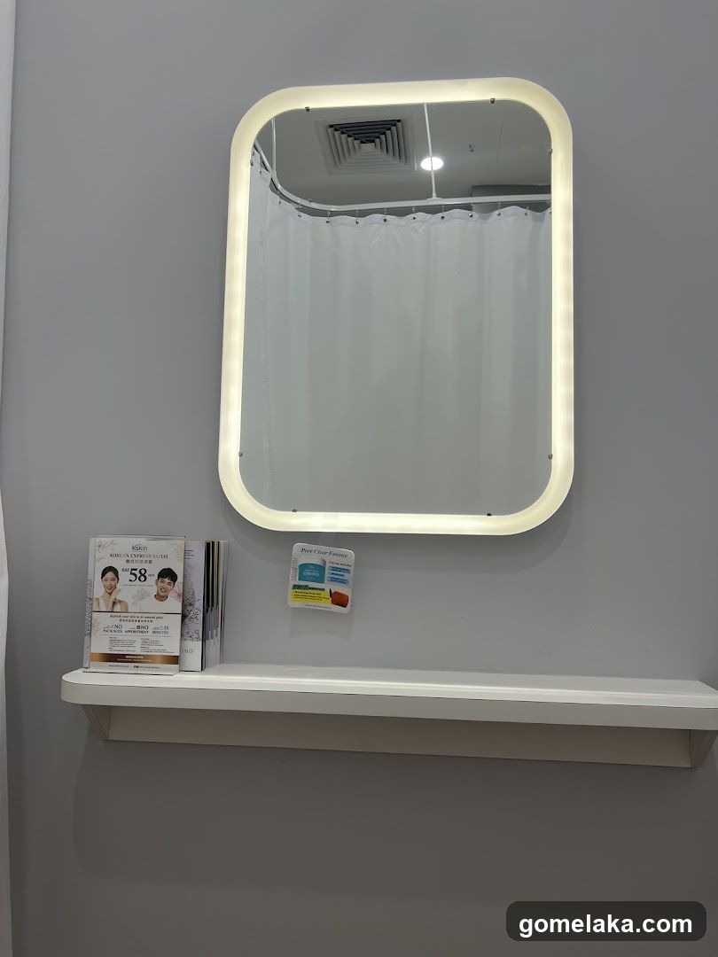 Wall-mounted mirror with LED lighting