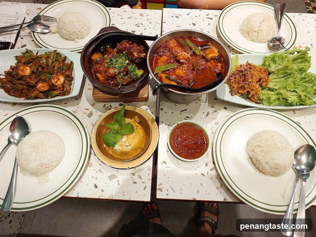 Table with various dishes and rice