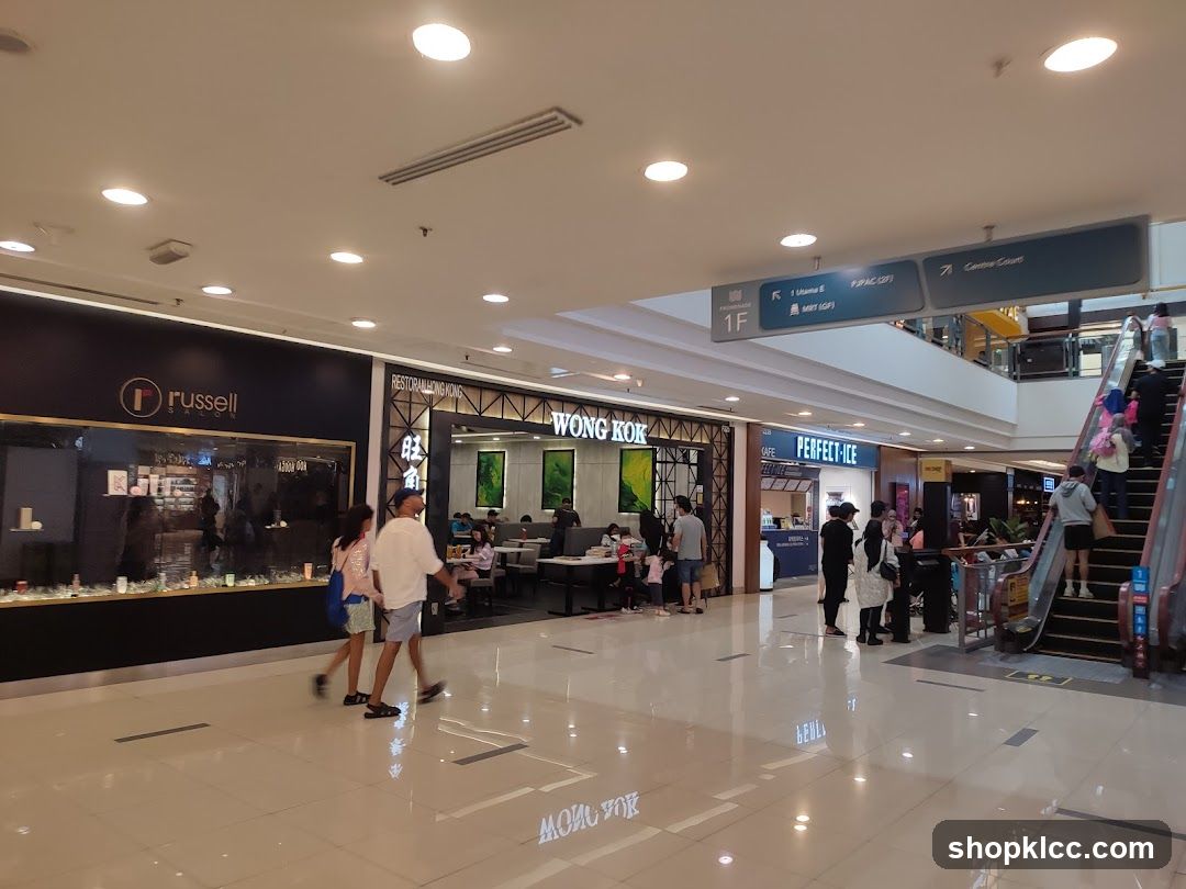 Mall Interior with Shops and Escalators