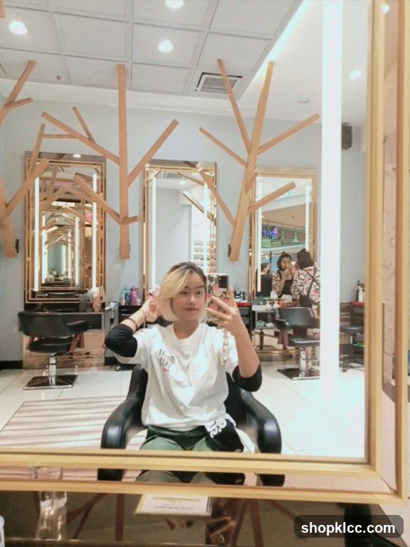 Salon Interior with Woman Taking Selfie