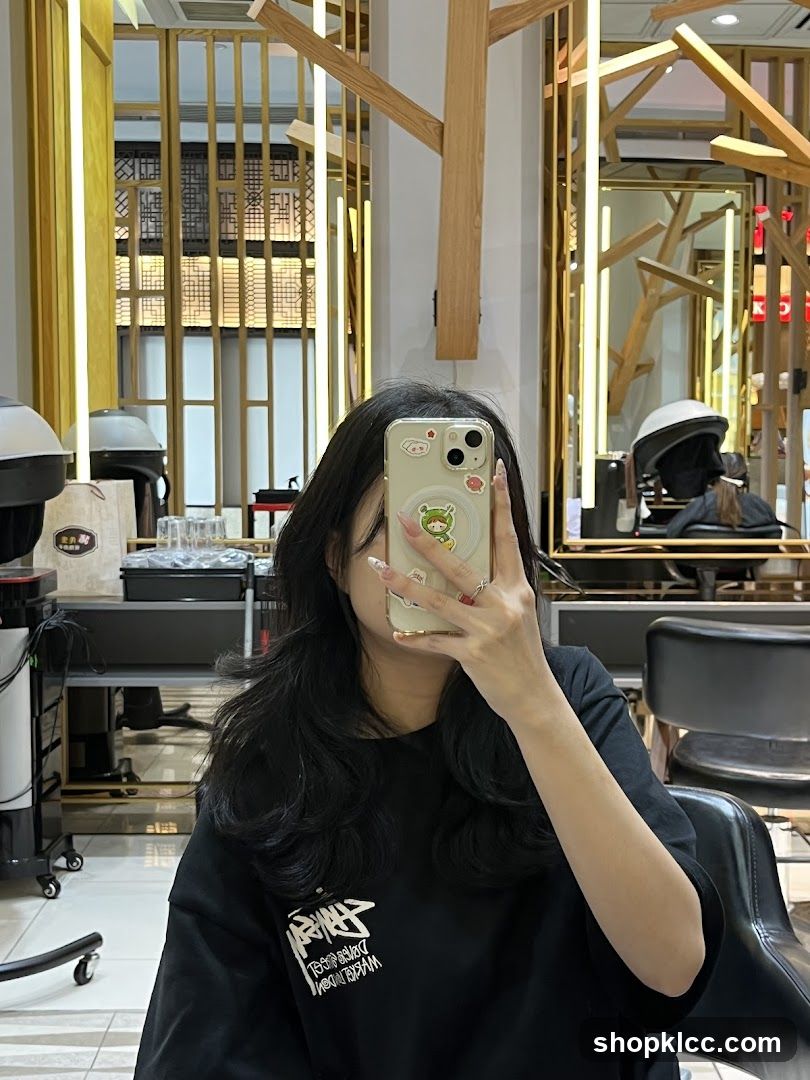Woman taking a selfie in a salon
