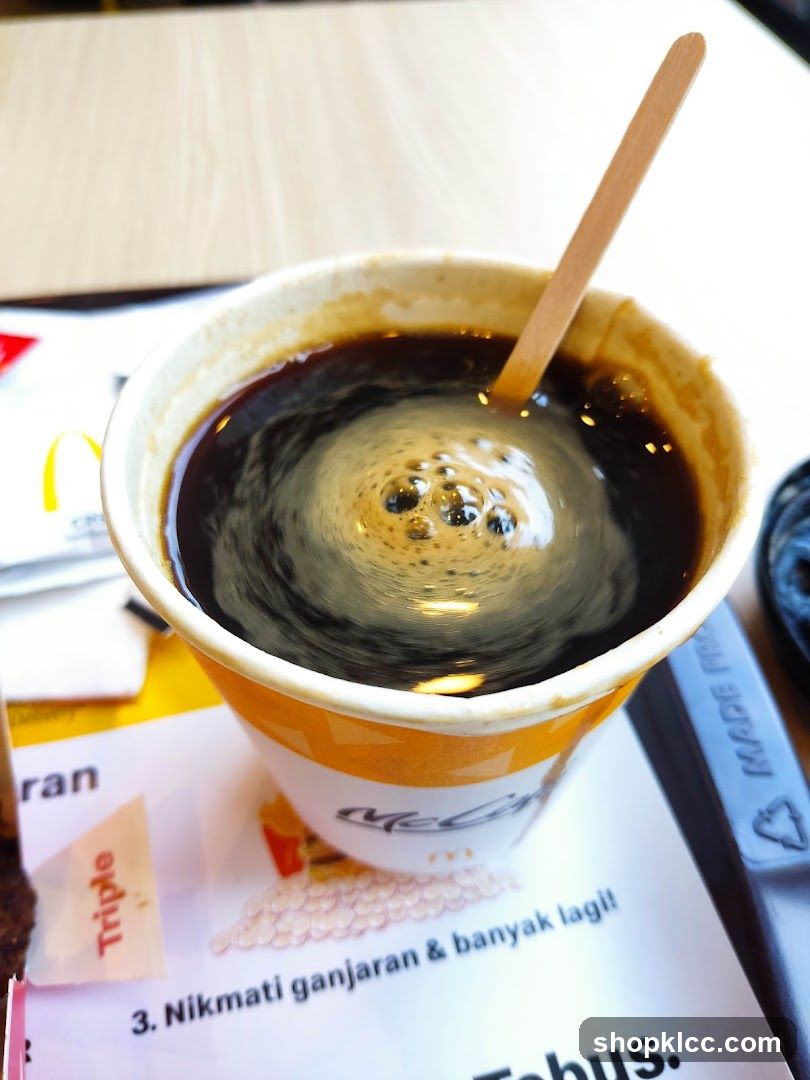 Coffee Cup with Stirring Stick