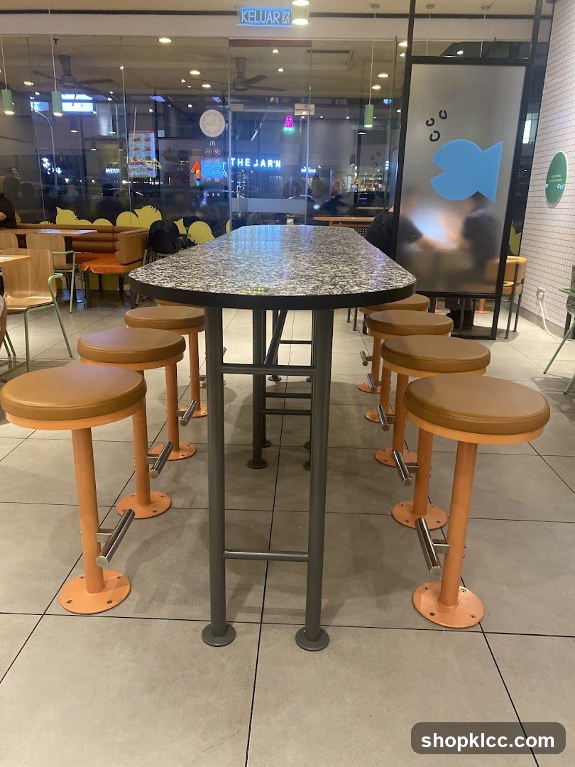 High Table and Stools in a Cafeteria or Food Court