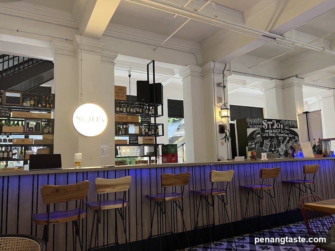 Bar Interior with Stools and Signage