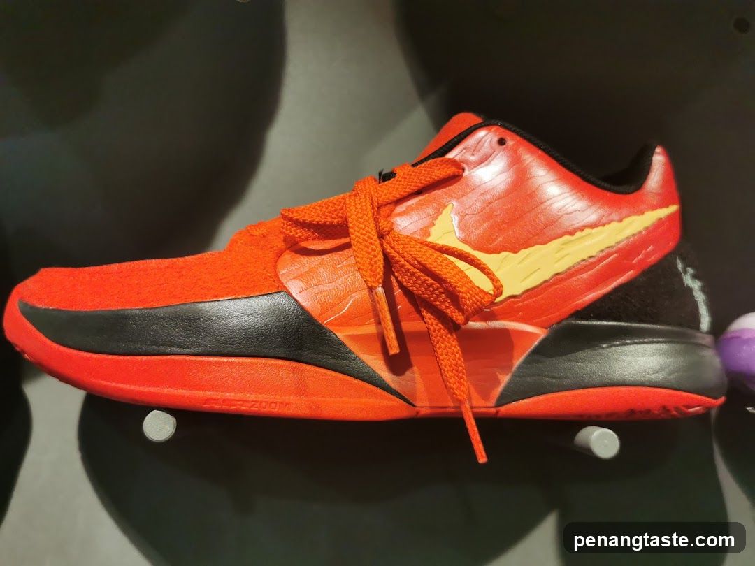 Red and Yellow Nike Basketball Shoe