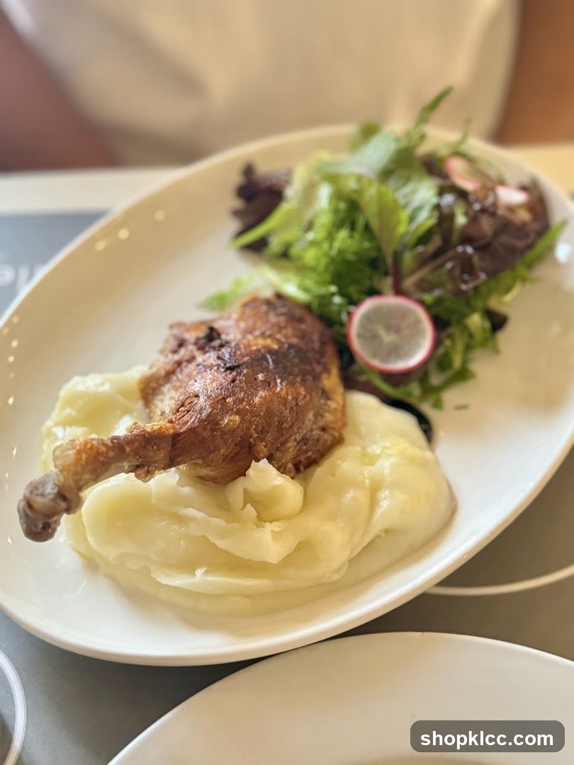 Duck Confit with Mashed Potatoes and Salad