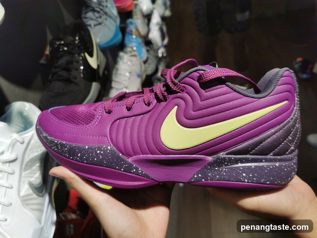 Purple Nike Basketball Shoe