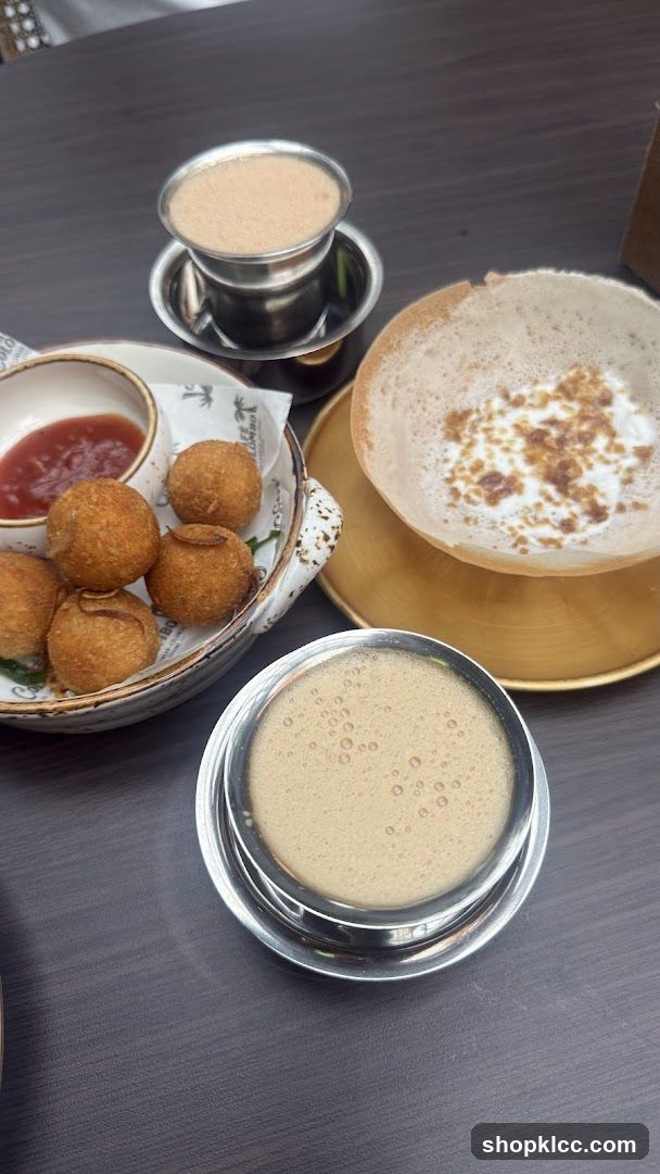 Appam and fried snacks with coffee