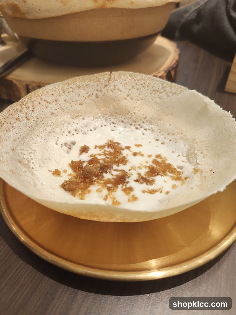 Appam with Coconut Milk and Jaggery