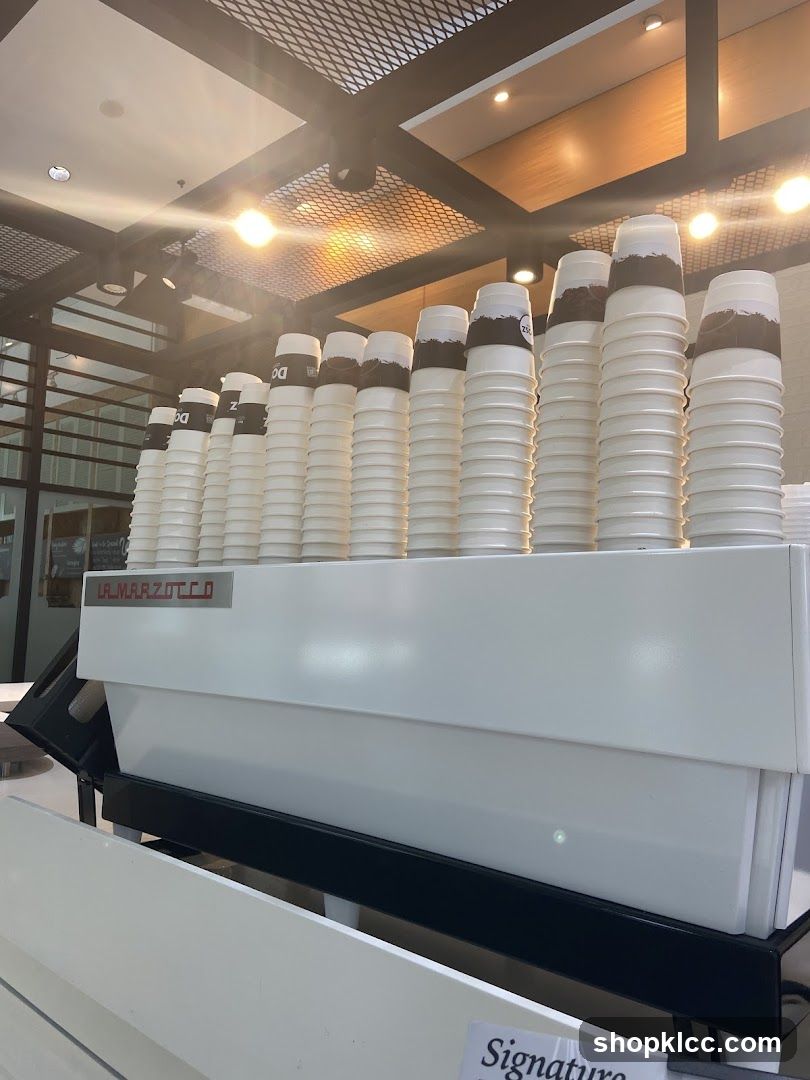 Coffee Cups Stacked on Espresso Machine