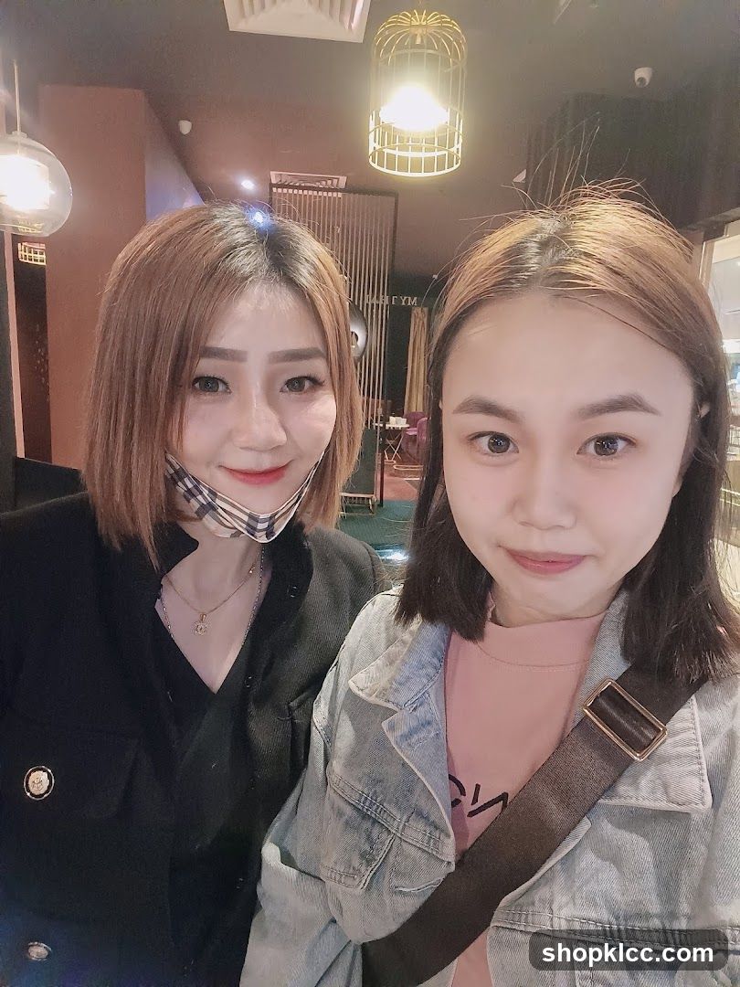 Two women posing for a selfie