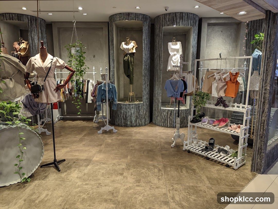 Clothing store interior with mannequins and clothing racks