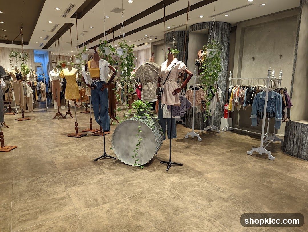 Clothing store interior with mannequins and racks of clothes