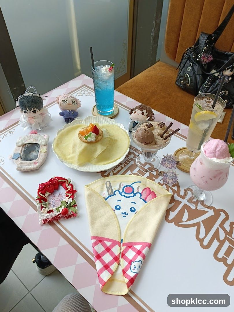 Cafe Table Spread with Desserts and Merchandise