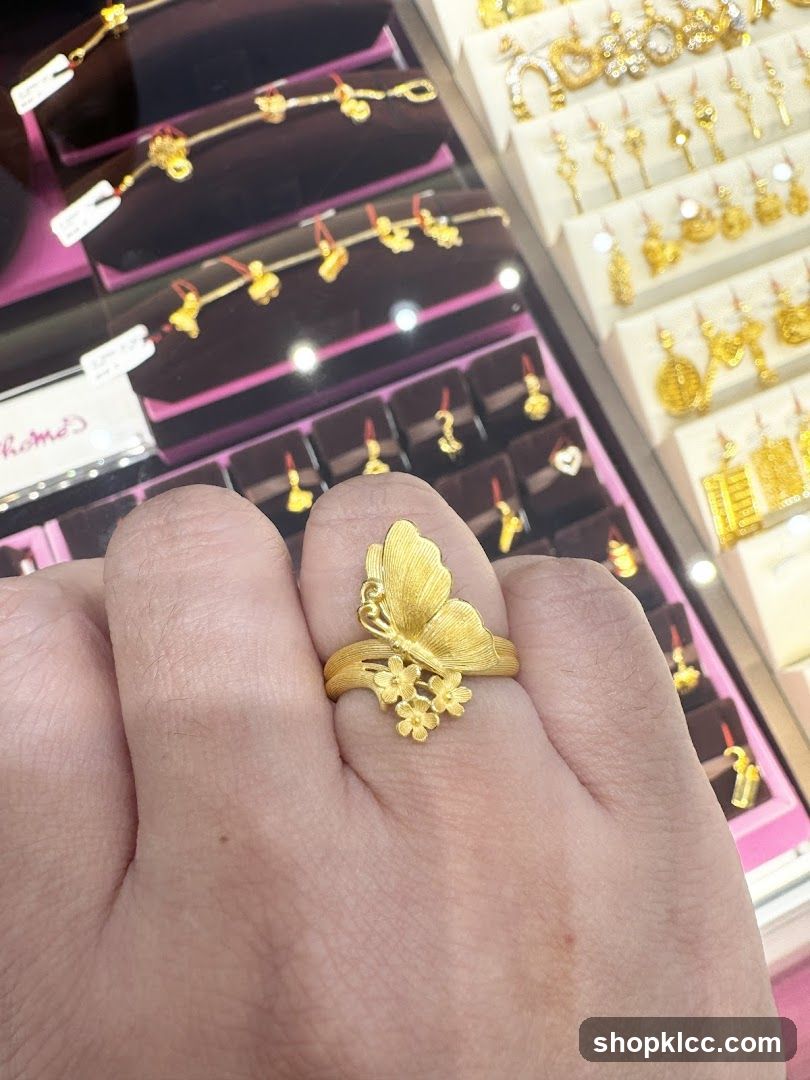 Gold Butterfly Ring with Flowers