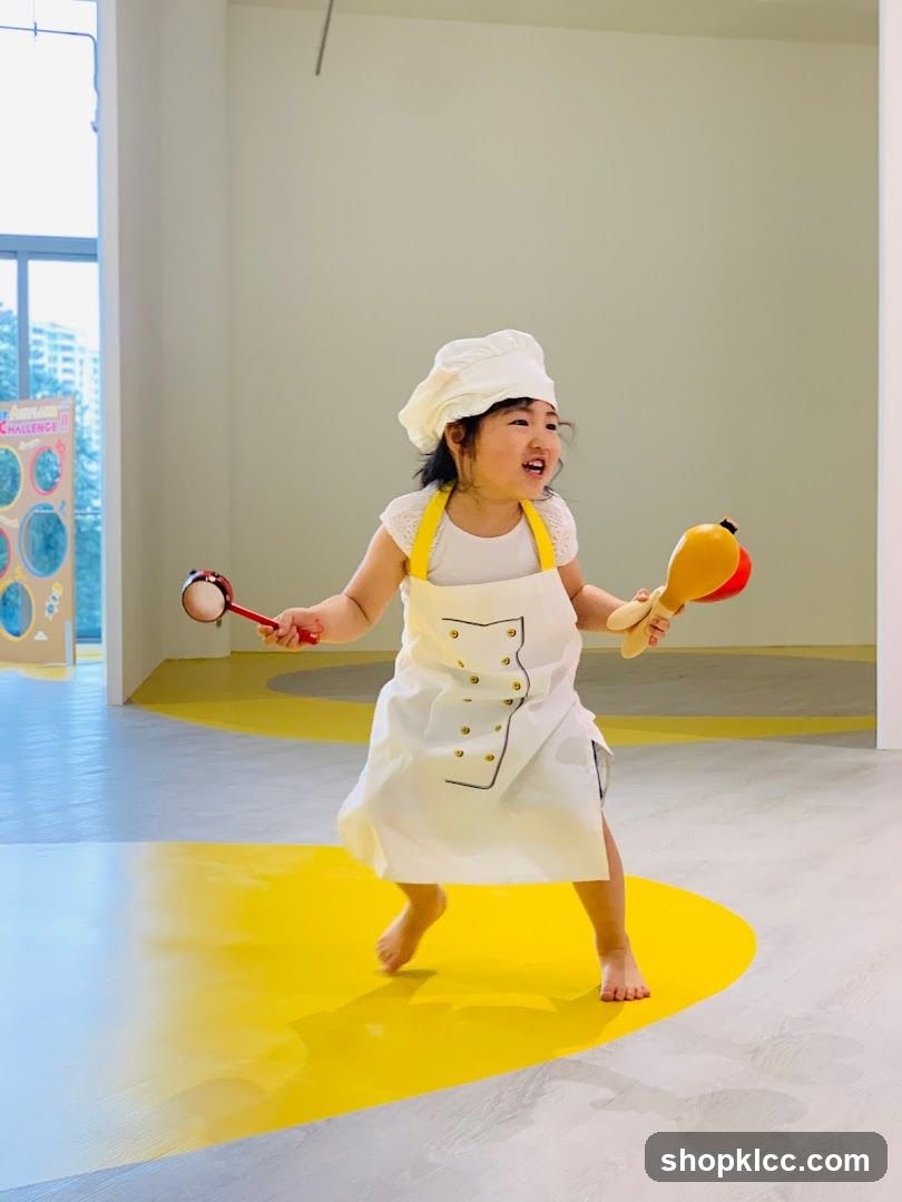 Child Dressed as Chef Playing
