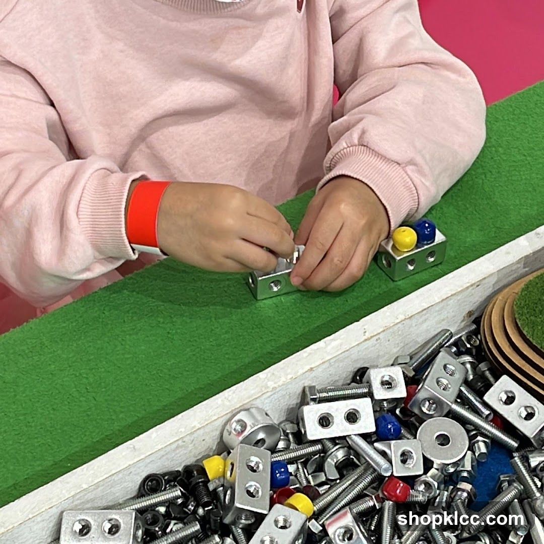Child playing with construction toys