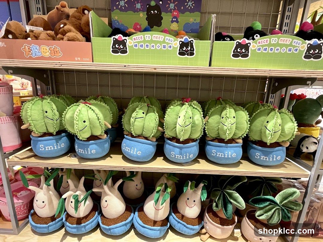 Cactus plush toys on shelves