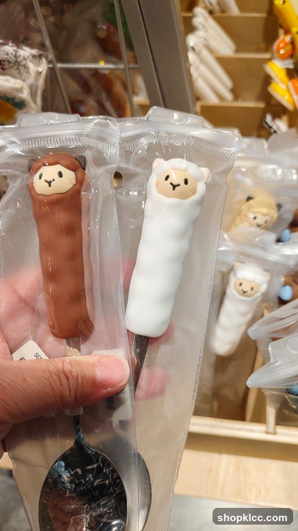 Animal-themed spoons in packaging