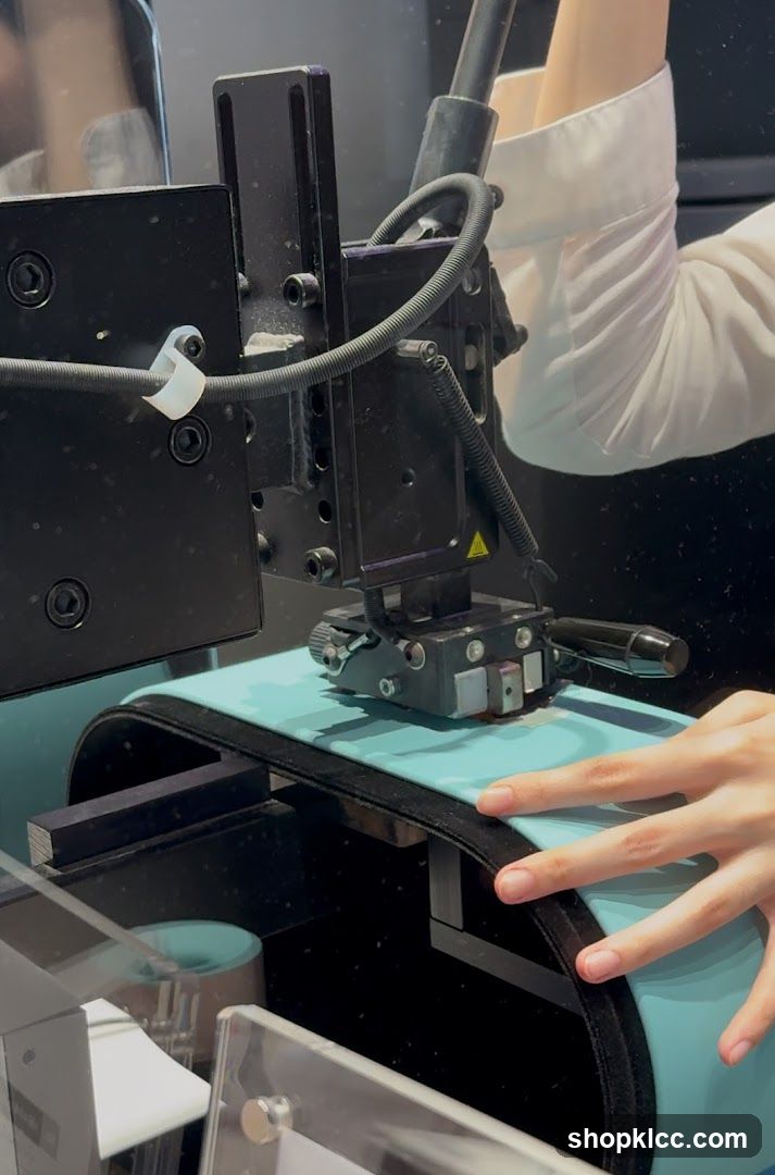 Close-up of a machine with a person's hands