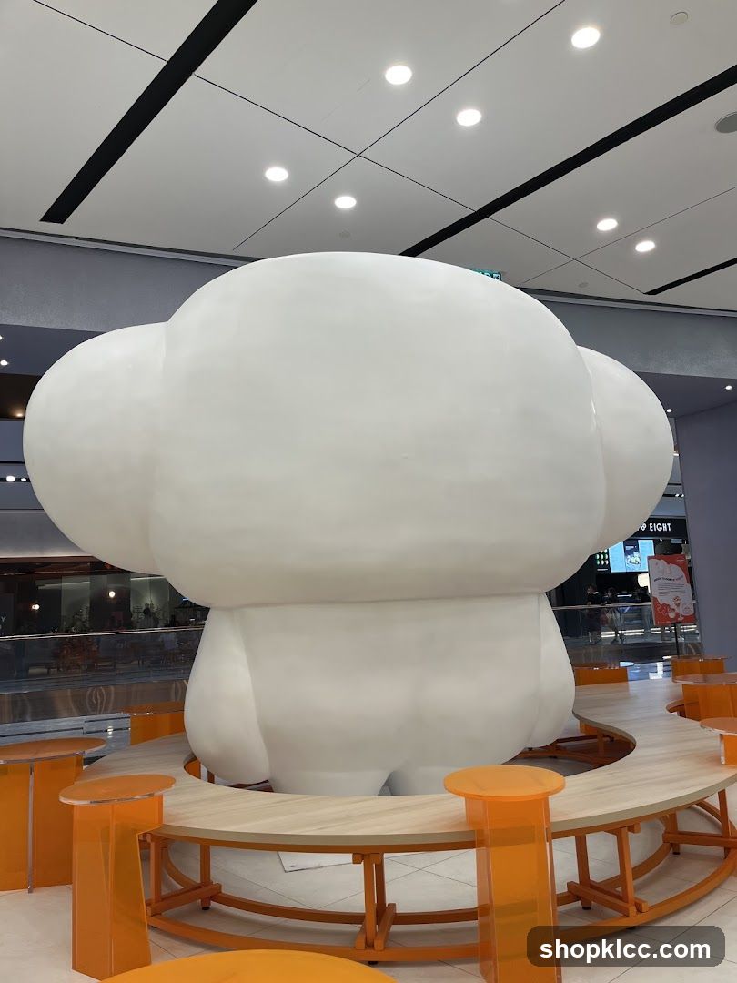 White Sculpture in Mall Interior