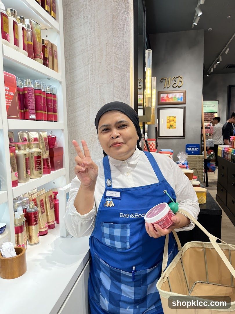 Employee holding product