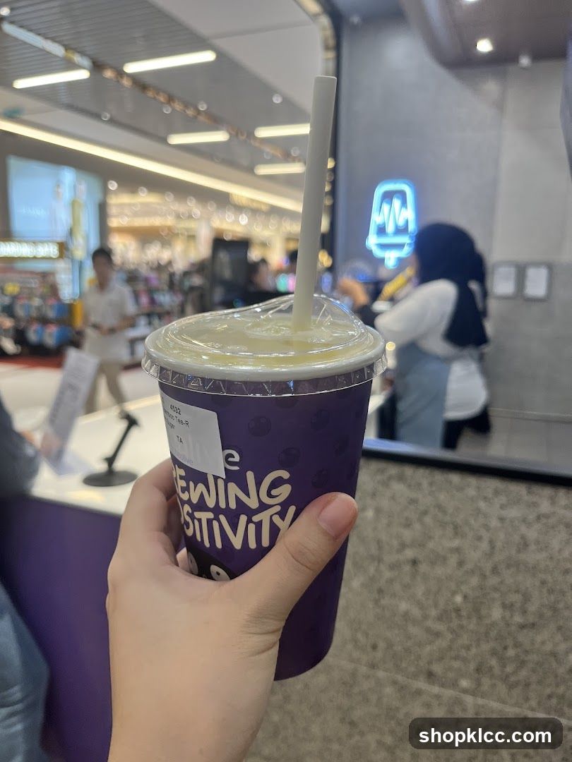 Person holding a drink