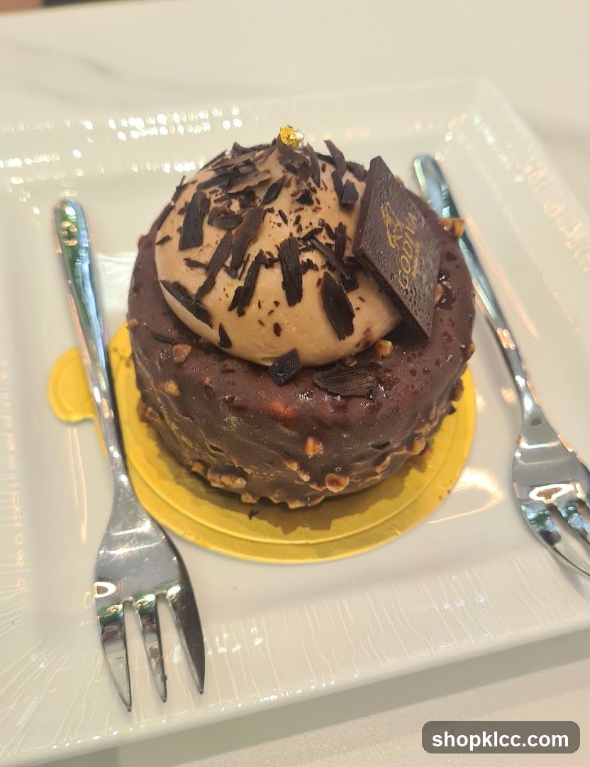 Chocolate Cake with Gold Leaf and Godiva Chocolate Square
