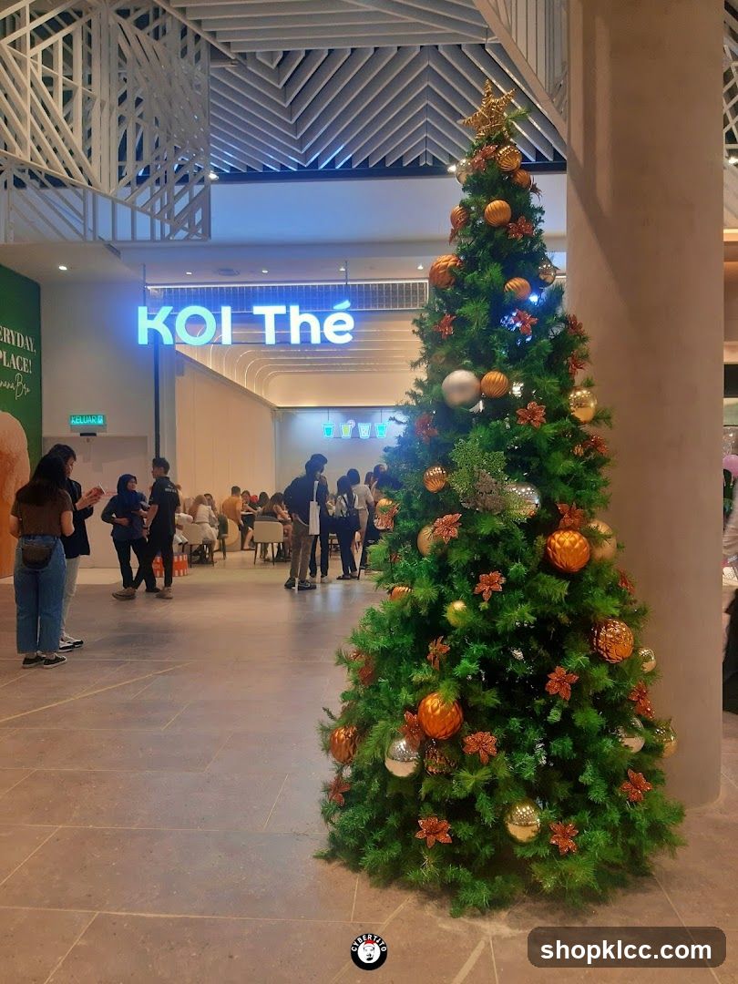 Christmas Tree in Front of Koi Thé