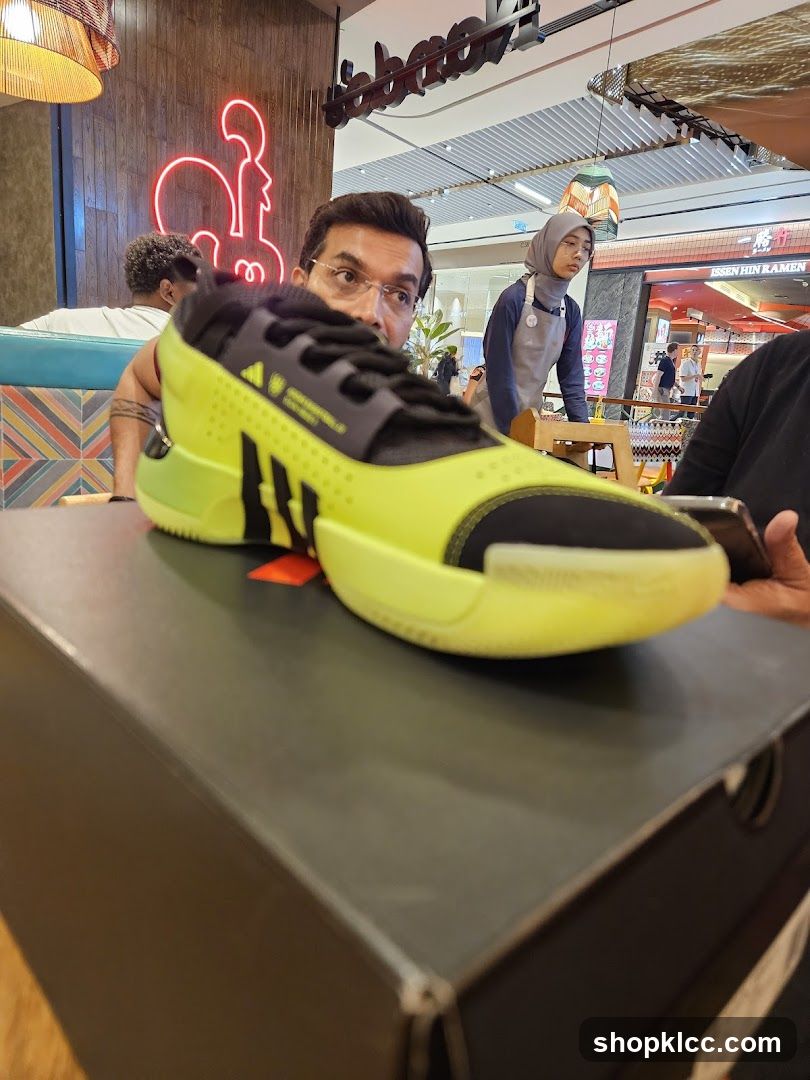 Man with a neon yellow shoe
