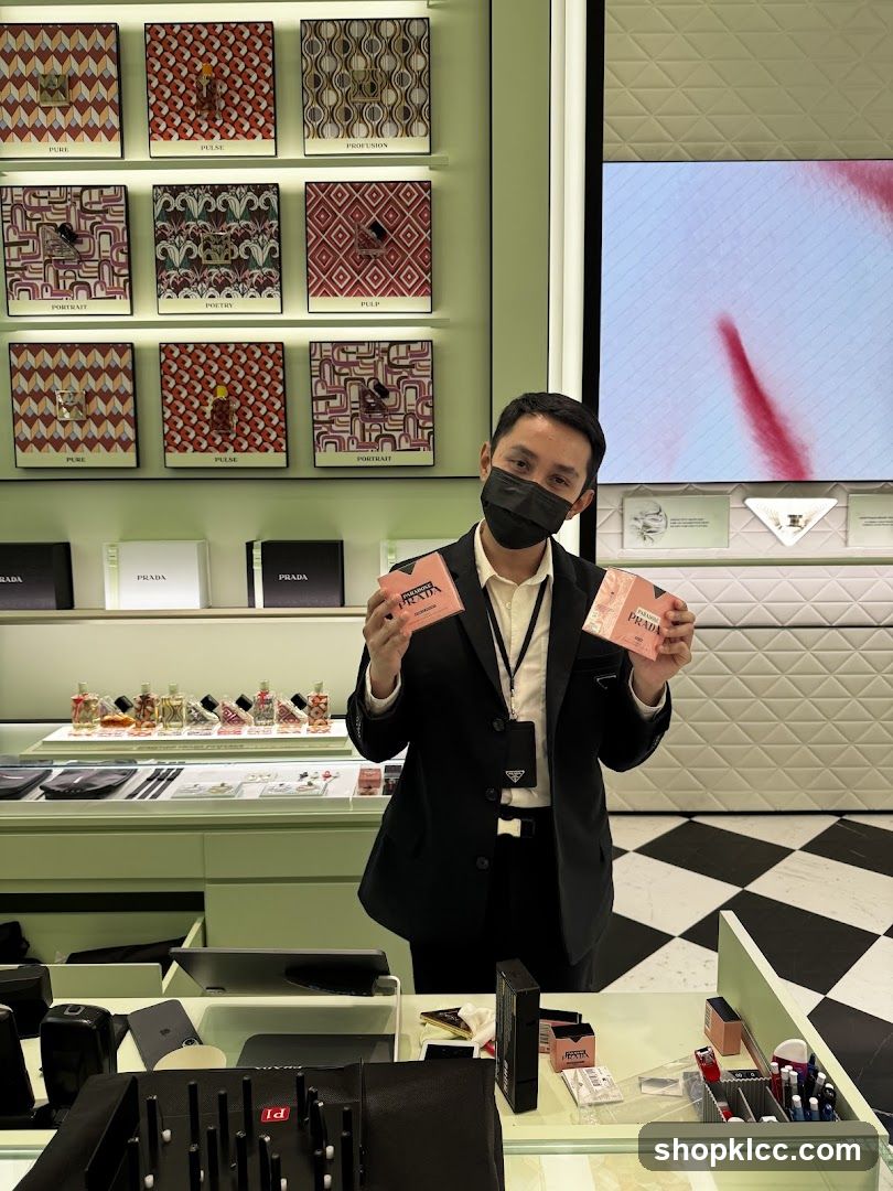 Man holding Prada products in a store