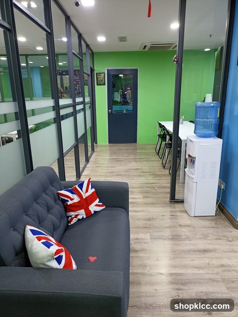Interior Lounge Area with Green Wall and Water Dispenser