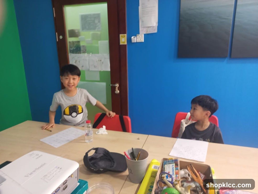 Children at a table with art supplies