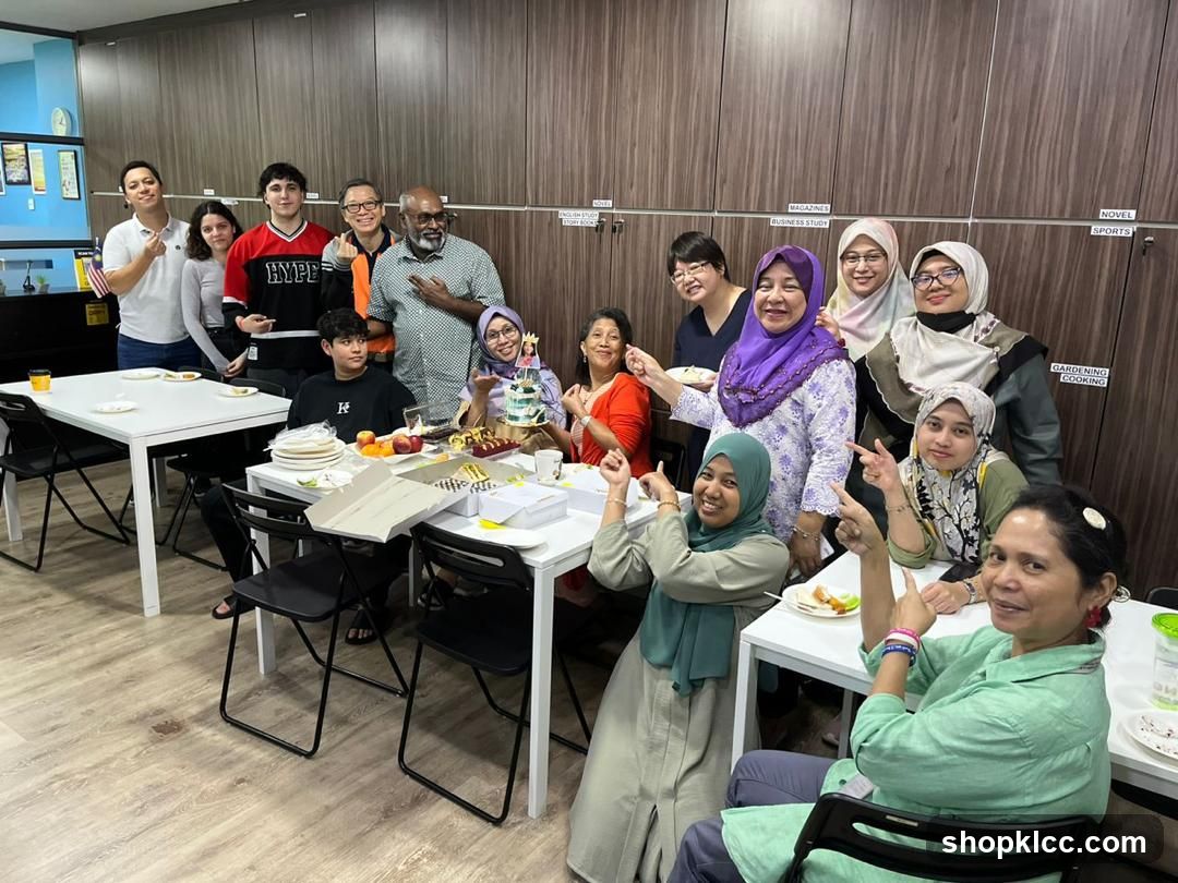 Group celebration with cake and food