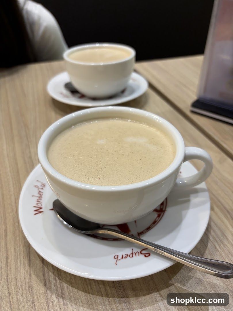 Two cups of coffee on saucers