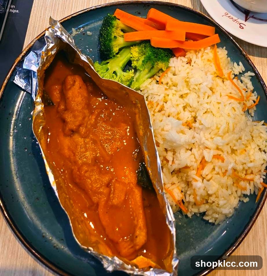 Fish dish with rice and vegetables