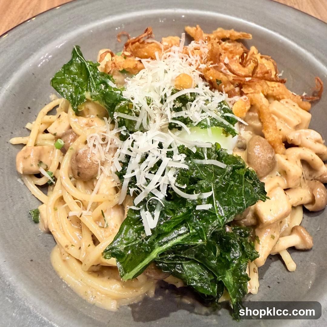 Mushroom Pasta with Kale and Crispy Onions