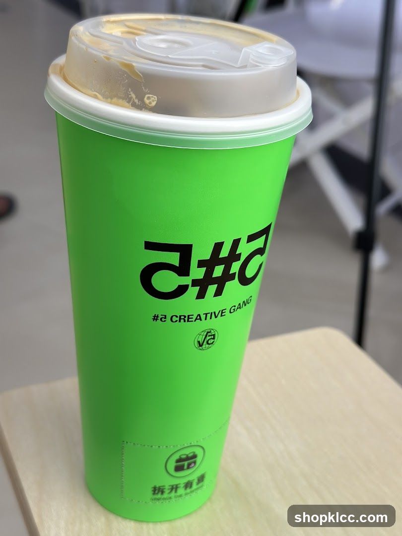 Green cup with logo
