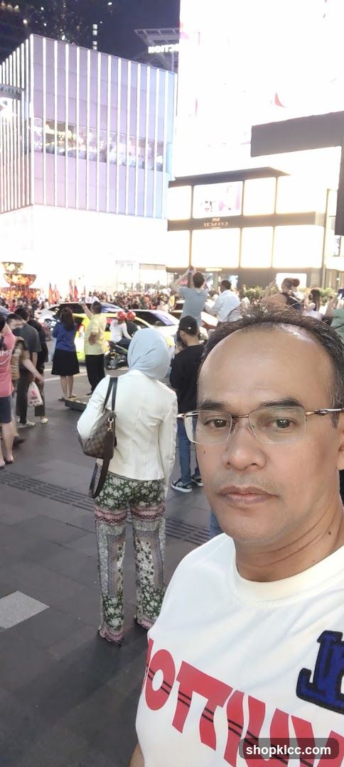 Man in a busy city street