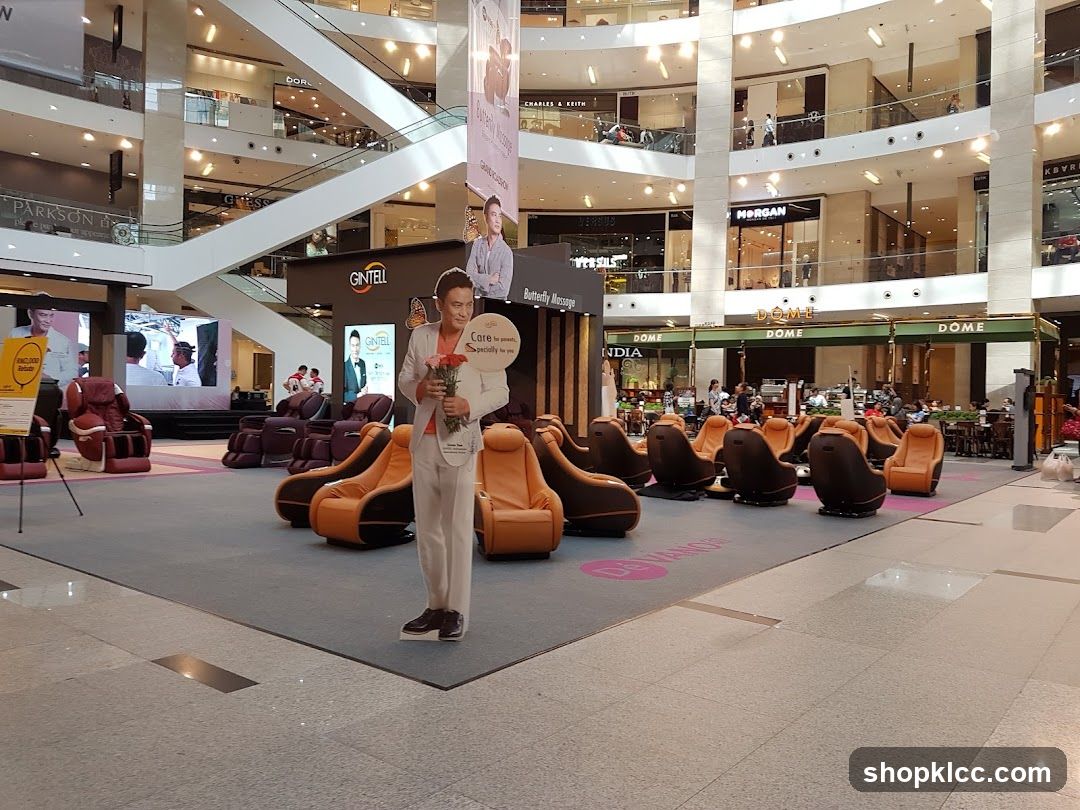 Shopping Mall Interior with Massage Chairs and Advertisements