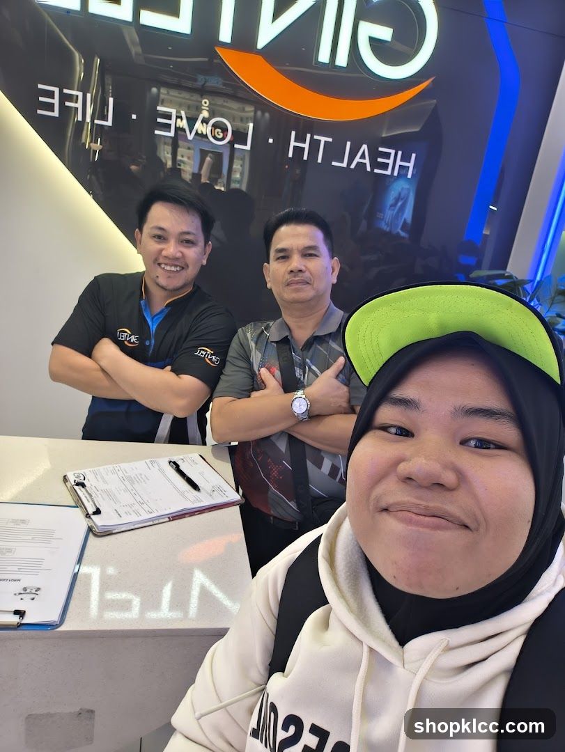 Staff and Customer at Reception Desk
